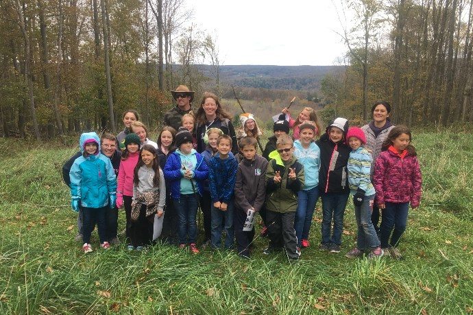 A group of campers at a fall overnighter.