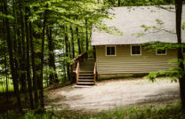 Outdoor side view of a camping cabin.